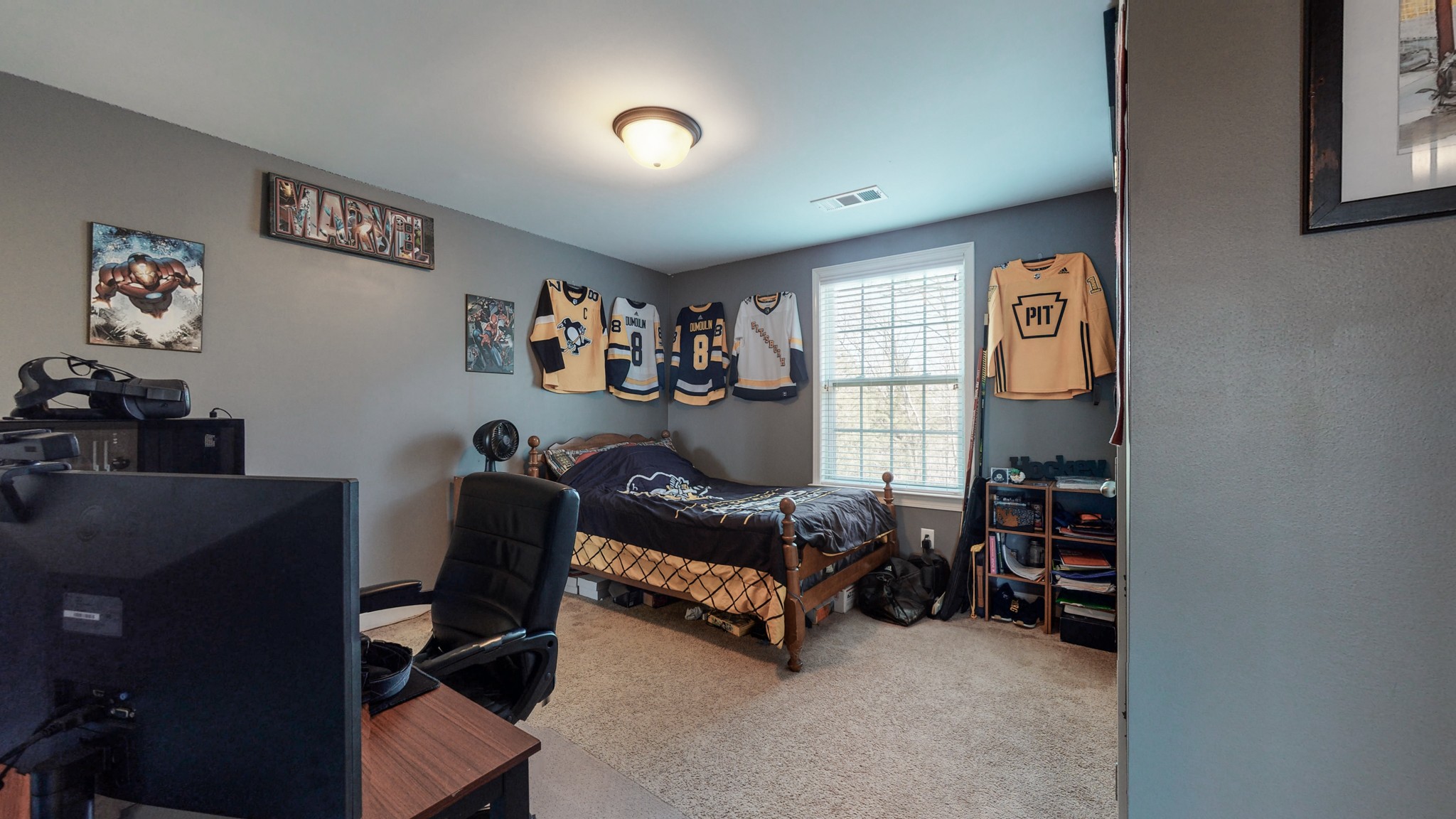 6137 Stags Leap Way Franklin, TN 37064 - Photo 20 of 27 a bedroom with furniture and a book shelf