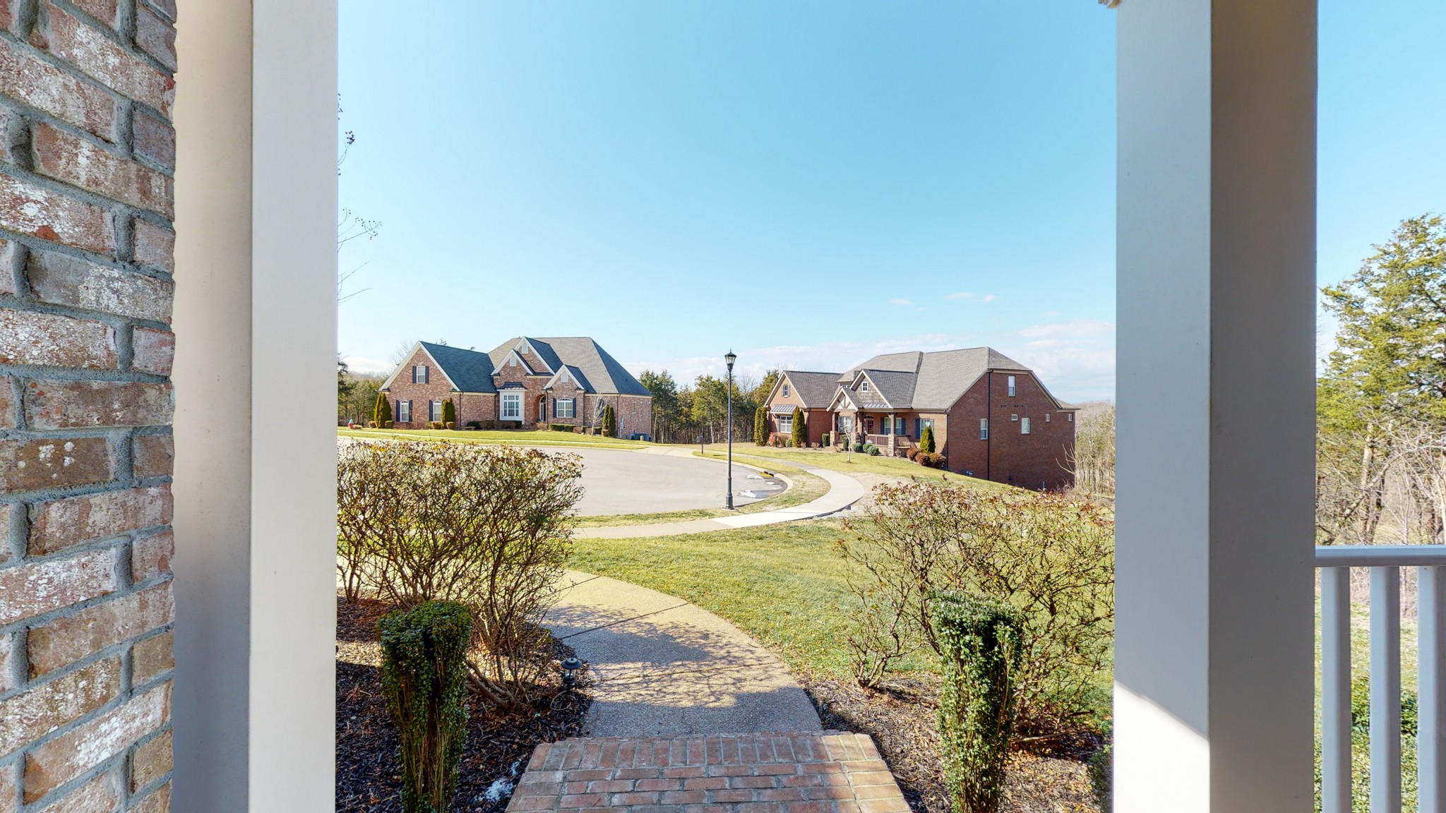 6137 Stags Leap Way Franklin, TN 37064 - Photo 23 of 27 a view of a bedroom with a bed and large window