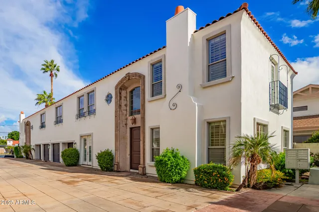a view of a building with a street