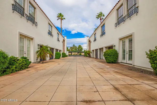 a view of a backyard of the house