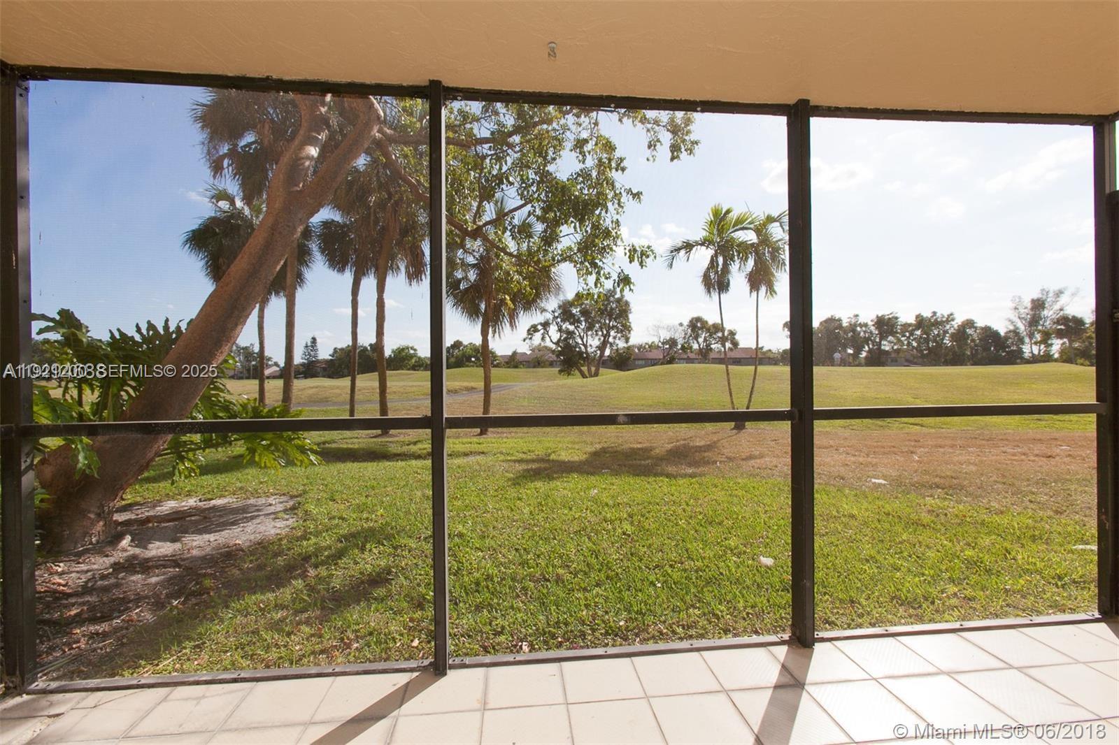 3821 Environ Boulevard, Unit 107 Lauderhill, FL 33319 - Photo 14 of 19 a view of swimming pool from a balcony