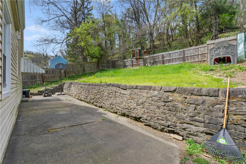 53 Lawrence Street Pittsburgh, PA 15209 - Photo 17 of 36 a view of a backyard with a garden