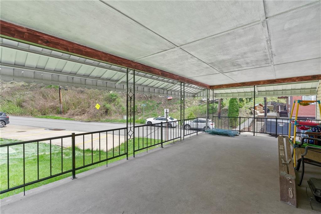 53 Lawrence Street Pittsburgh, PA 15209 - Photo 18 of 36 a view of a patio with glass top table and chairs