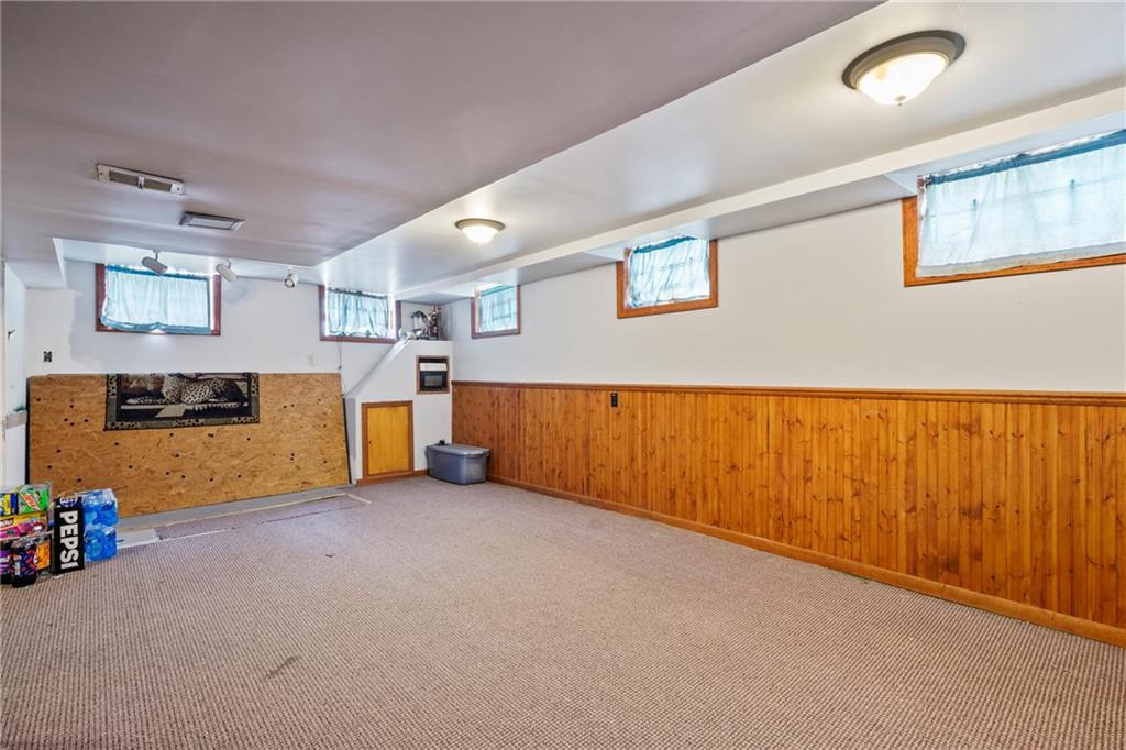 53 Lawrence Street Pittsburgh, PA 15209 - Photo 28 of 36 a view of an empty room with wooden wall