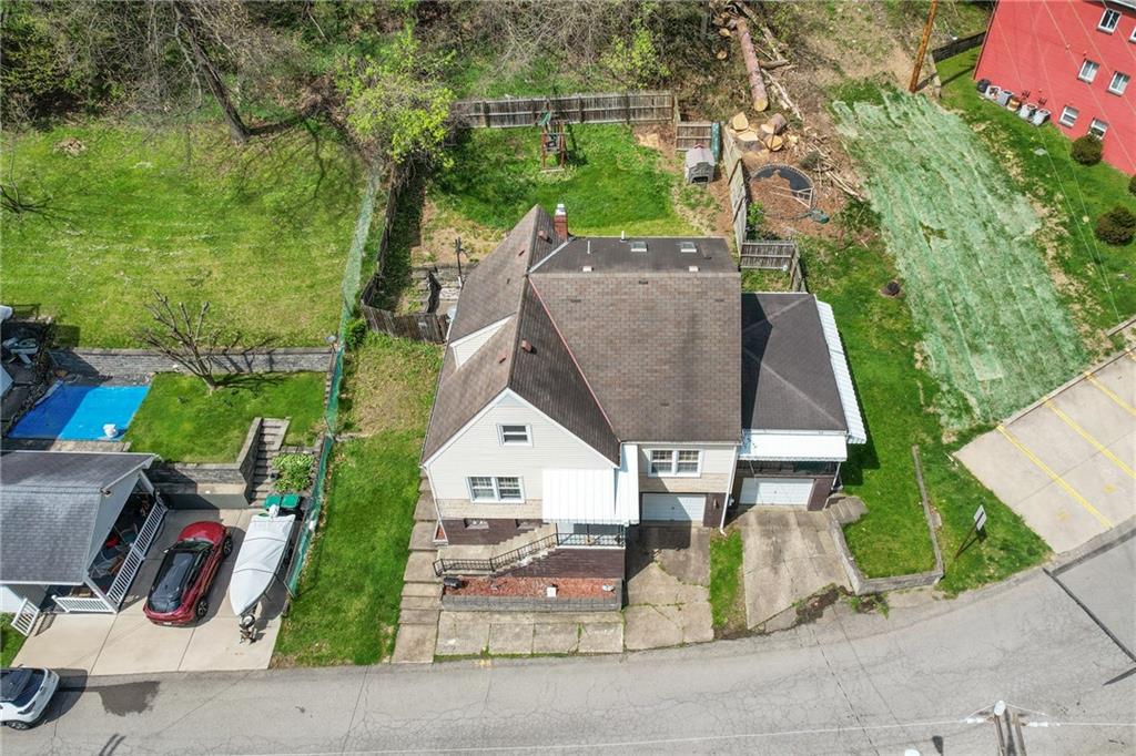 53 Lawrence Street Pittsburgh, PA 15209 - Photo 31 of 36 an aerial view of a house with garden space and sitting area