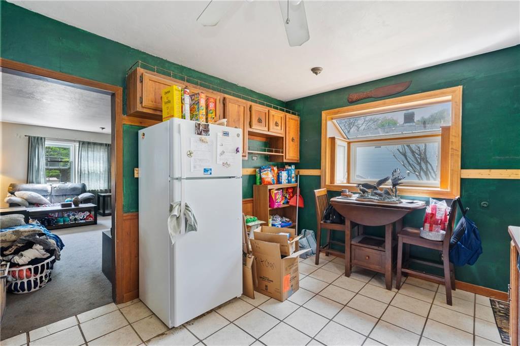 53 Lawrence Street Pittsburgh, PA 15209 - Photo 8 of 36 a work place with chairs and window