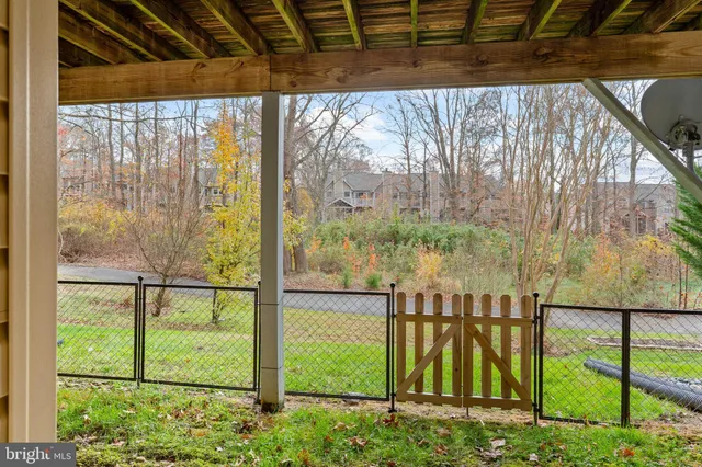 a view of a chair and table in the balcony