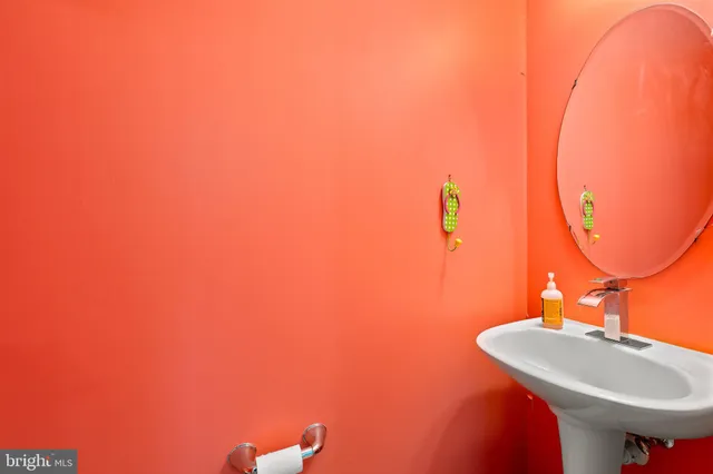 a room with a large window and furniture