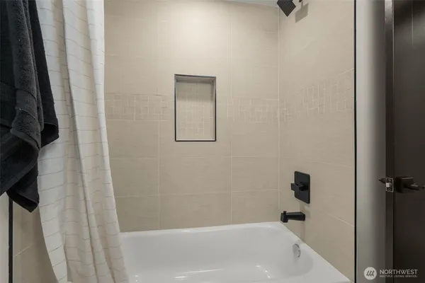 a bathroom with a bathtub