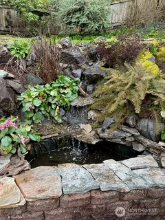 a view of outdoor space and a yard