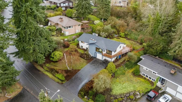 an aerial view of a house with a garden