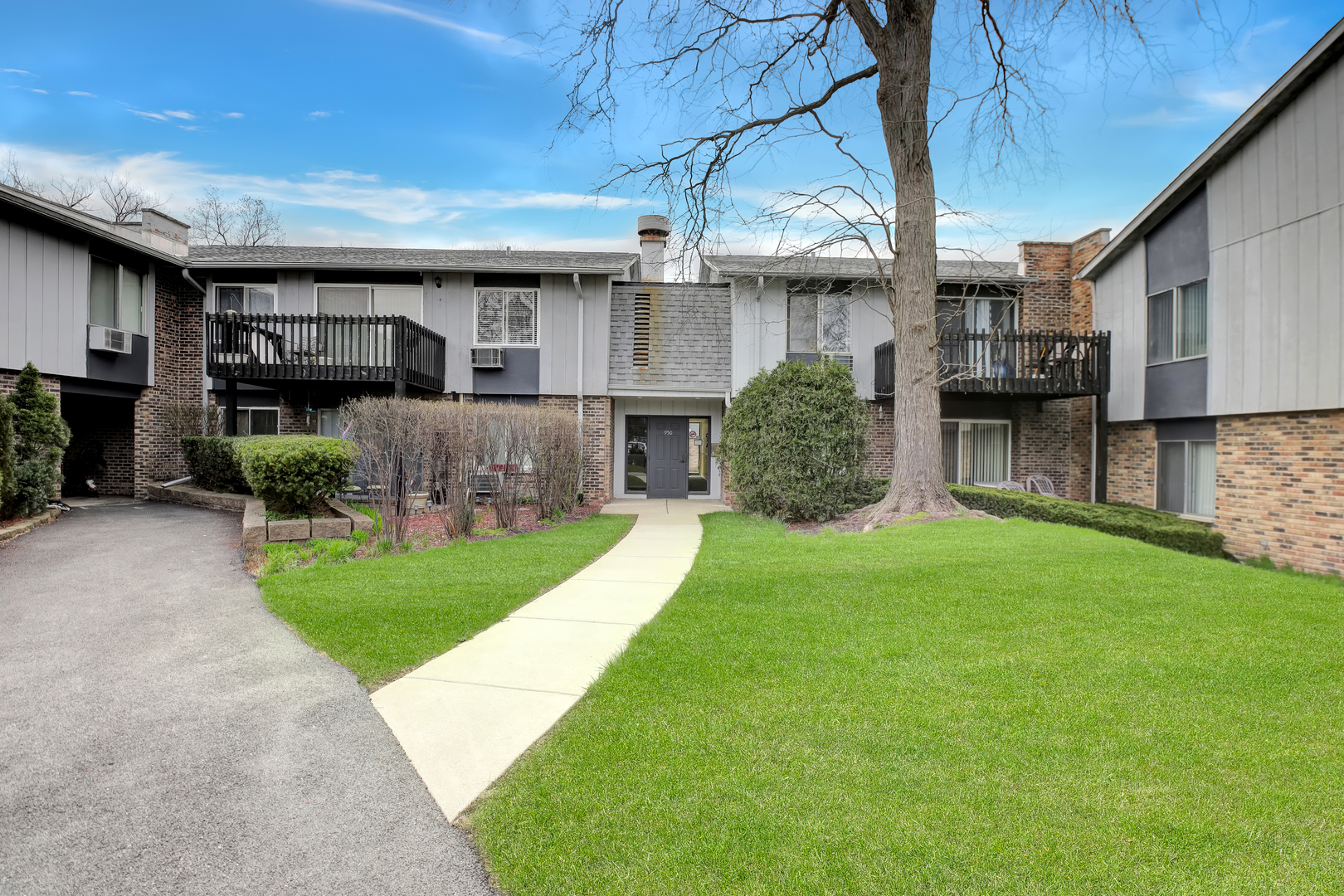 a view of a house with a back yard