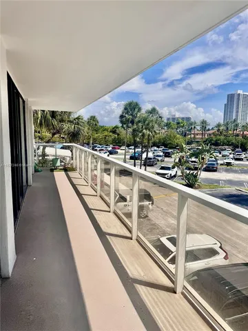 a view of balcony with furniture