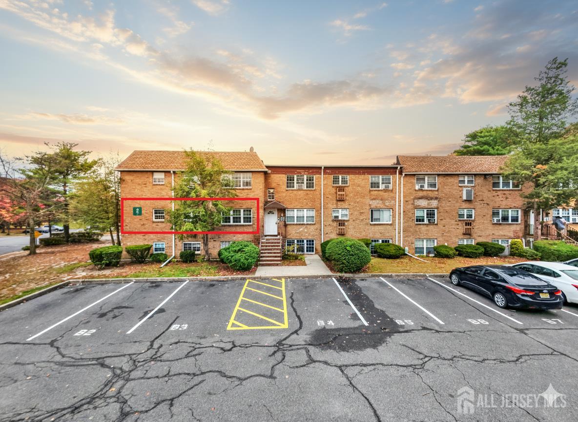 14 College Drive Edison, NJ 08817 - Photo 2 of 22 a view of a city with tall buildings