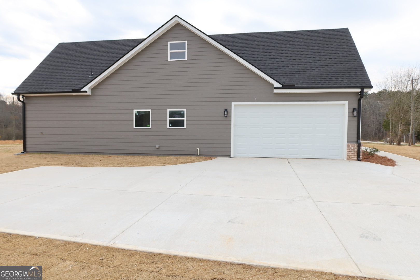 1205 Rocky Creek Road Hampton, GA 30228 - Photo 5 of 9 a view of backyard of house