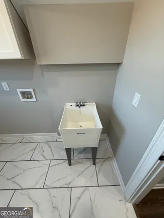 $449,999 | 1205 Rocky Creek Road, Hampton, GA 30228