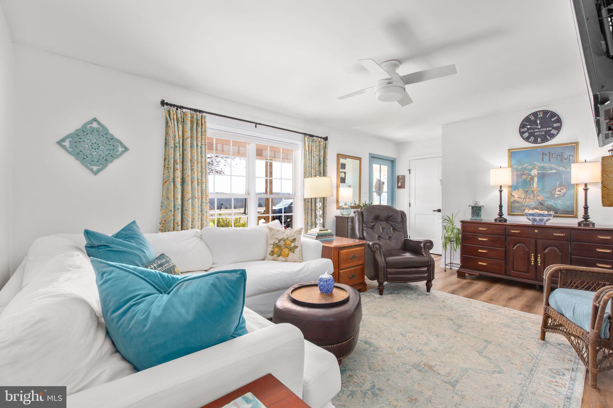 28896 Horseshoe Road Culpeper, VA 22701 - Photo 11 of 36 a living room with furniture and a large window