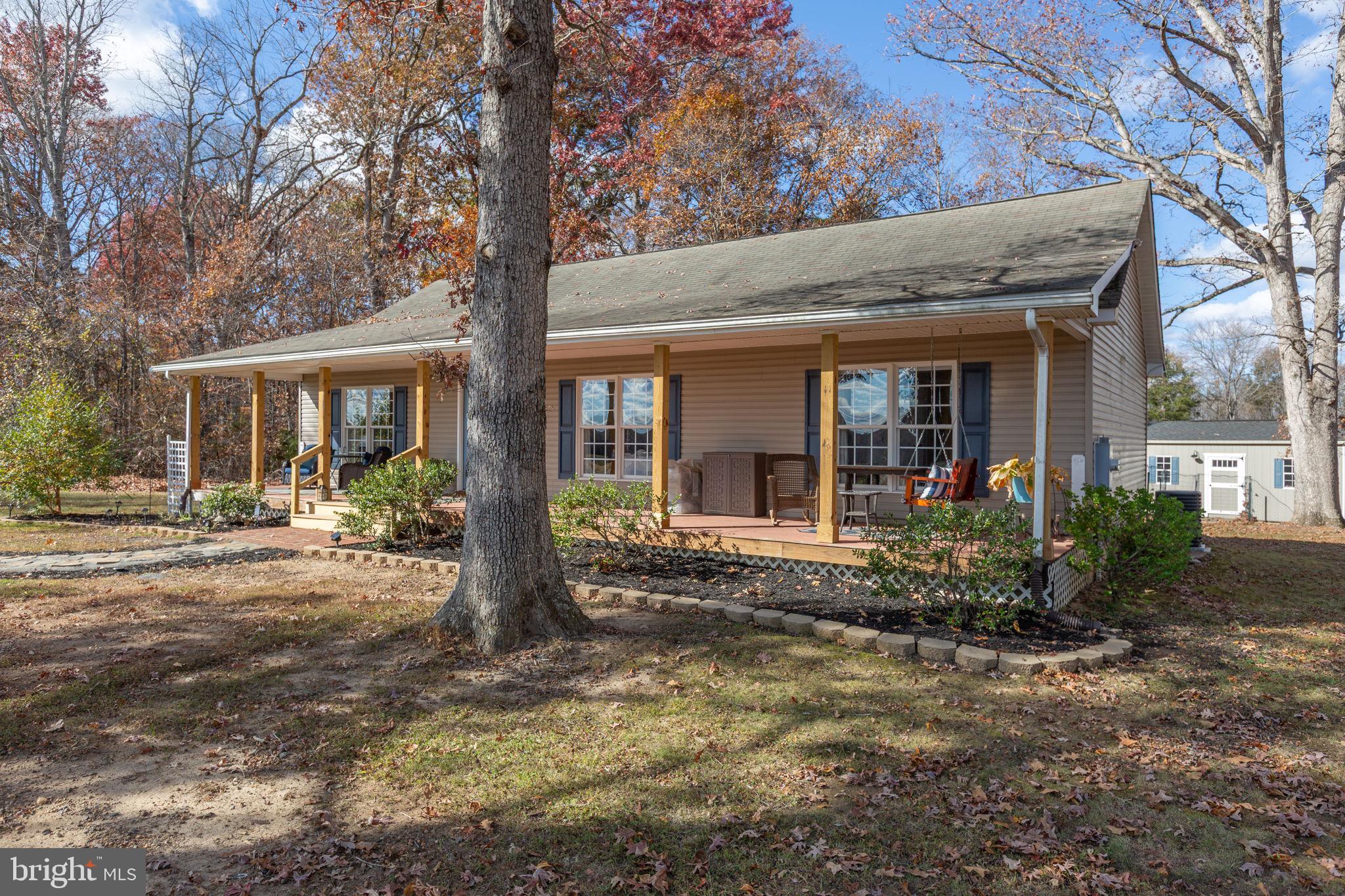 28896 Horseshoe Road Culpeper, VA 22701 - Photo 3 of 36 a front view of a house with garden