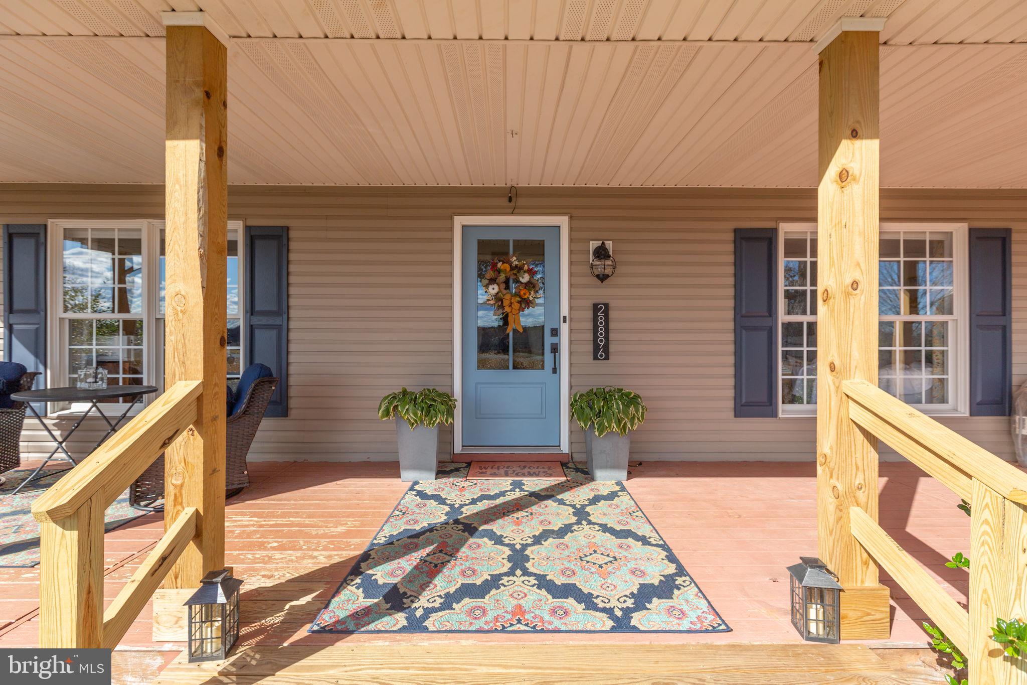 28896 Horseshoe Road Culpeper, VA 22701 - Photo 7 of 36 a front view of a house with a porch