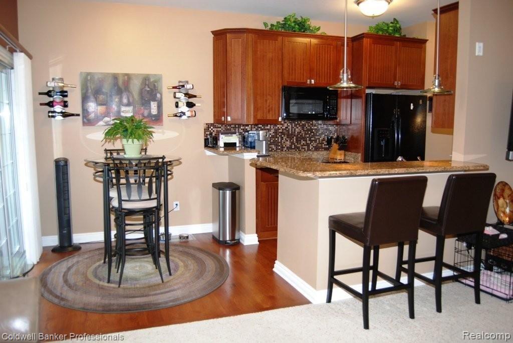 45870 South Stonewood Road Canton, MI 48187 - Photo 15 of 25 Kitchen & Nook w/hardwood flrs