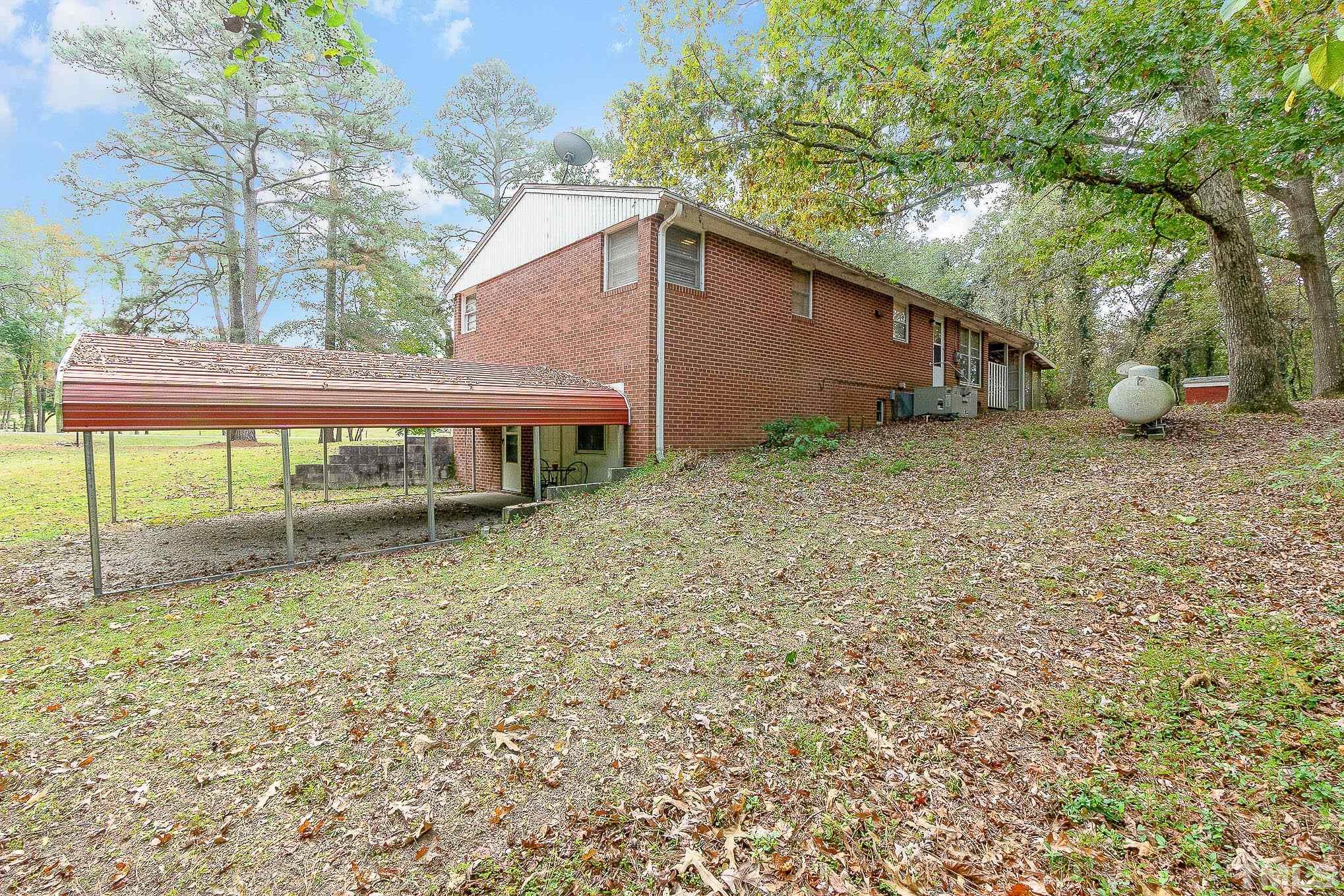1921 Ebenezer Church Road Coats, NC 27521 - Photo 24 of 24 a view of a house with a yard