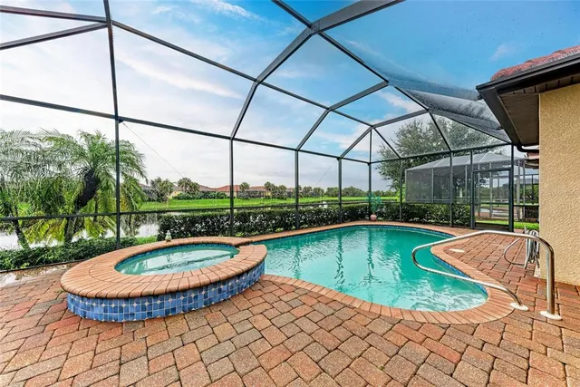 a view of a swimming pool with a porch