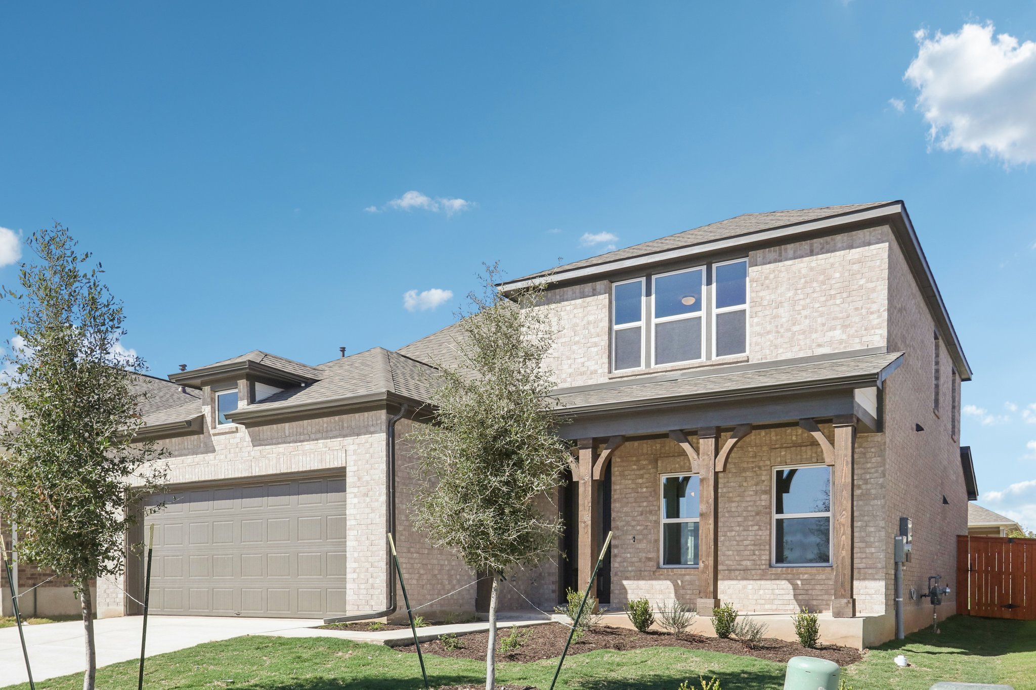 1332 Dog Iron Street Georgetown, TX 78633 - Photo 1 of 1 a front view of a house with garden
