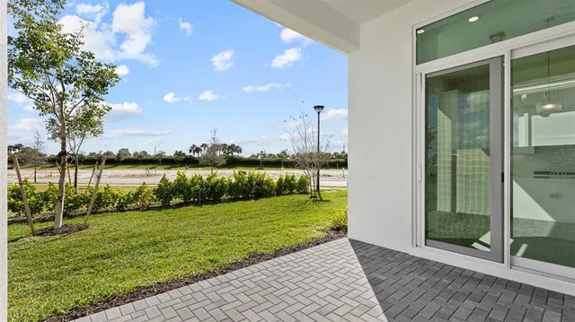 a view of a garden with a building