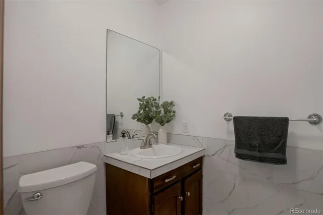 a bathroom with a sink and a toilet