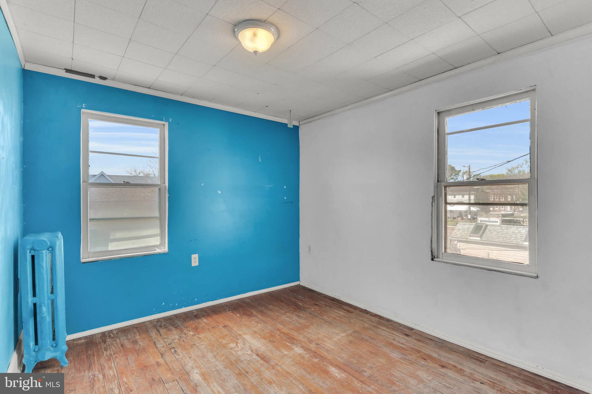 3724 5th Street Baltimore, MD 21225 - Photo 14 of 30 an empty room with windows