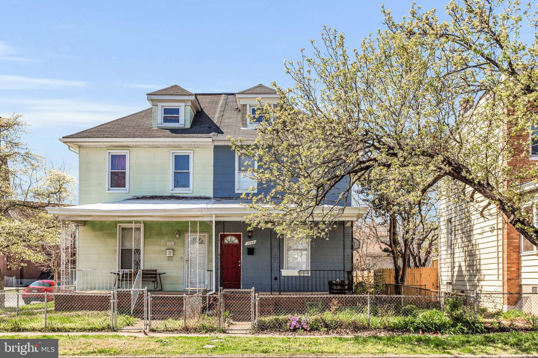 3724 5th Street Baltimore, MD 21225 - Photo 26 of 30 a front view of a house with a yard