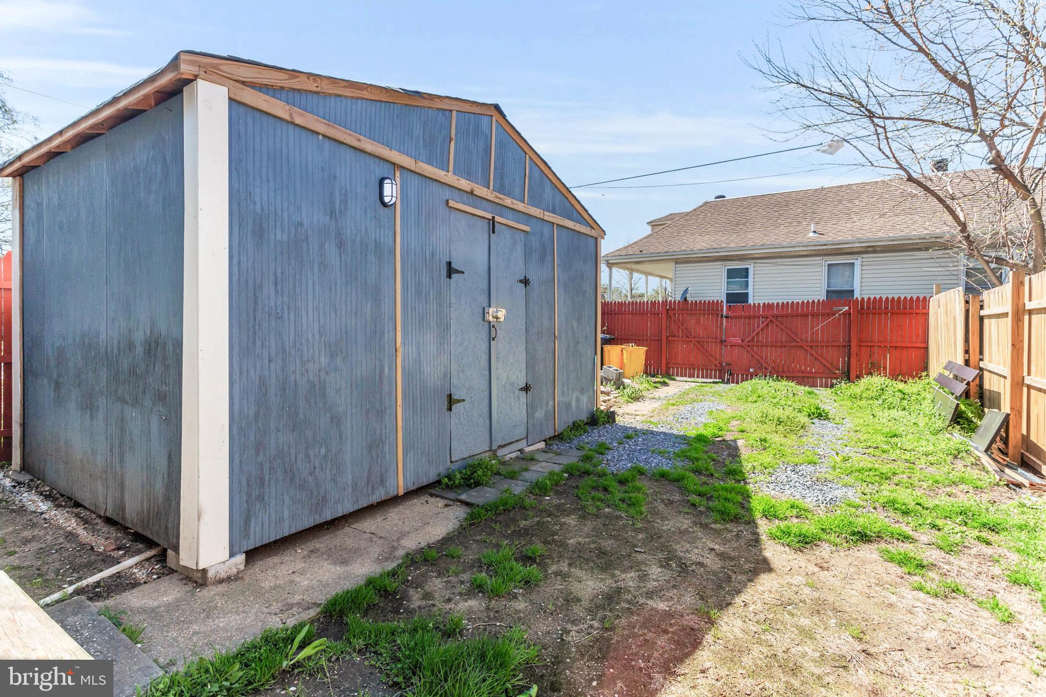 3724 5th Street Baltimore, MD 21225 - Photo 29 of 30 a backyard of a house with yard and outdoor seating