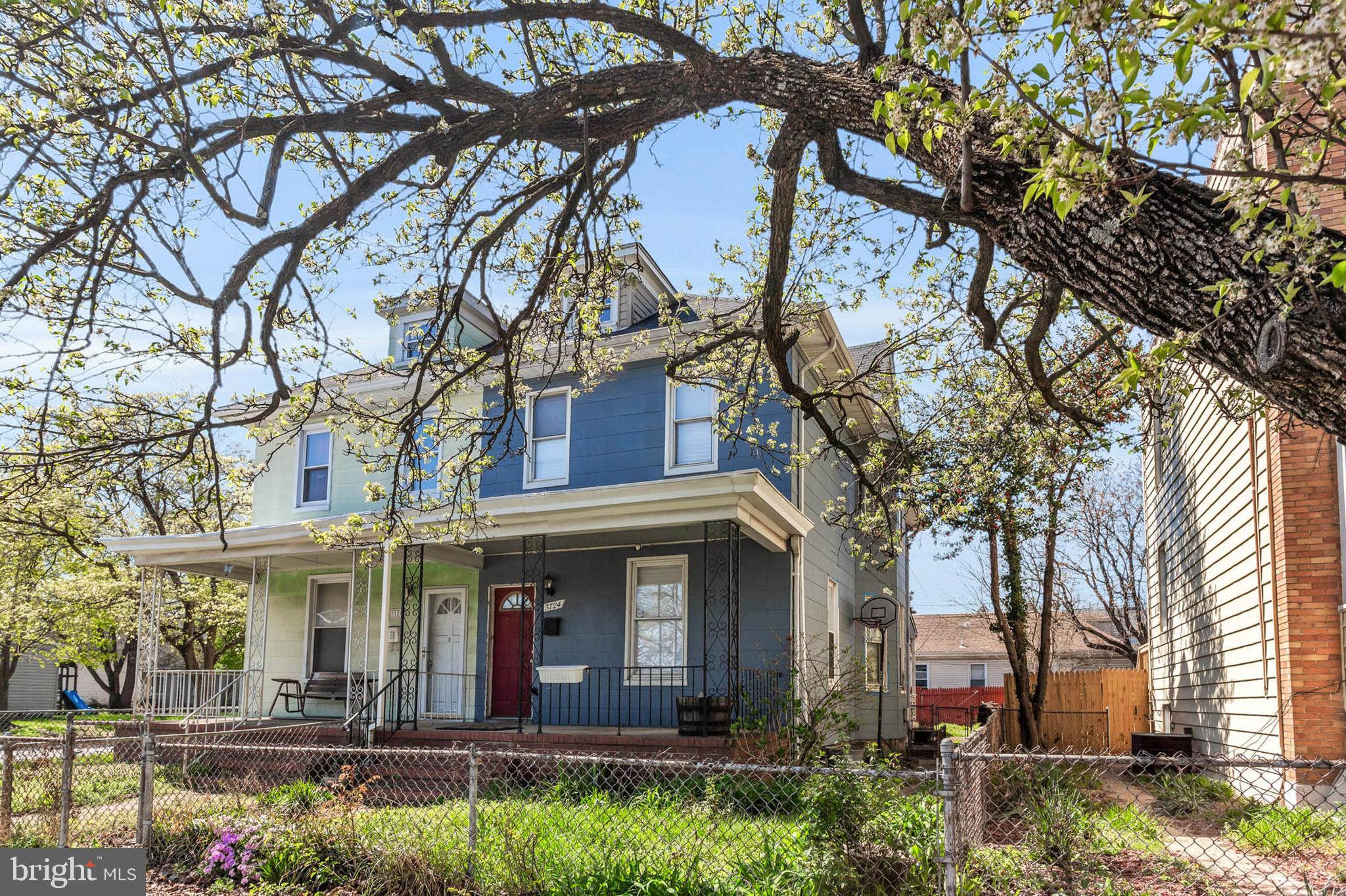 3724 5th Street Baltimore, MD 21225 - Photo 7 of 30 a view of a house with a yard