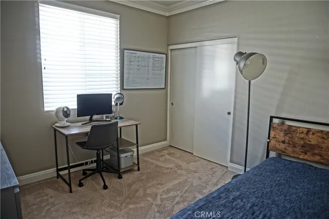 a view of a workspace with furniture