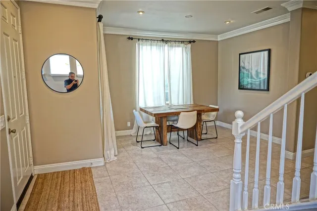 a view of a livingroom with furniture and window