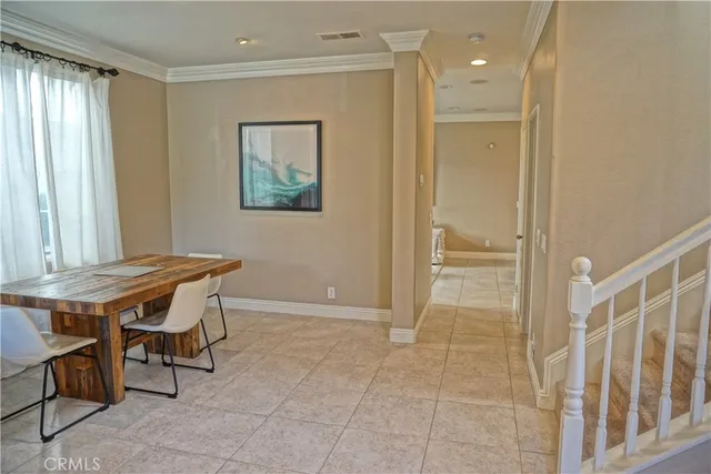 a view of a room with shelves and windows