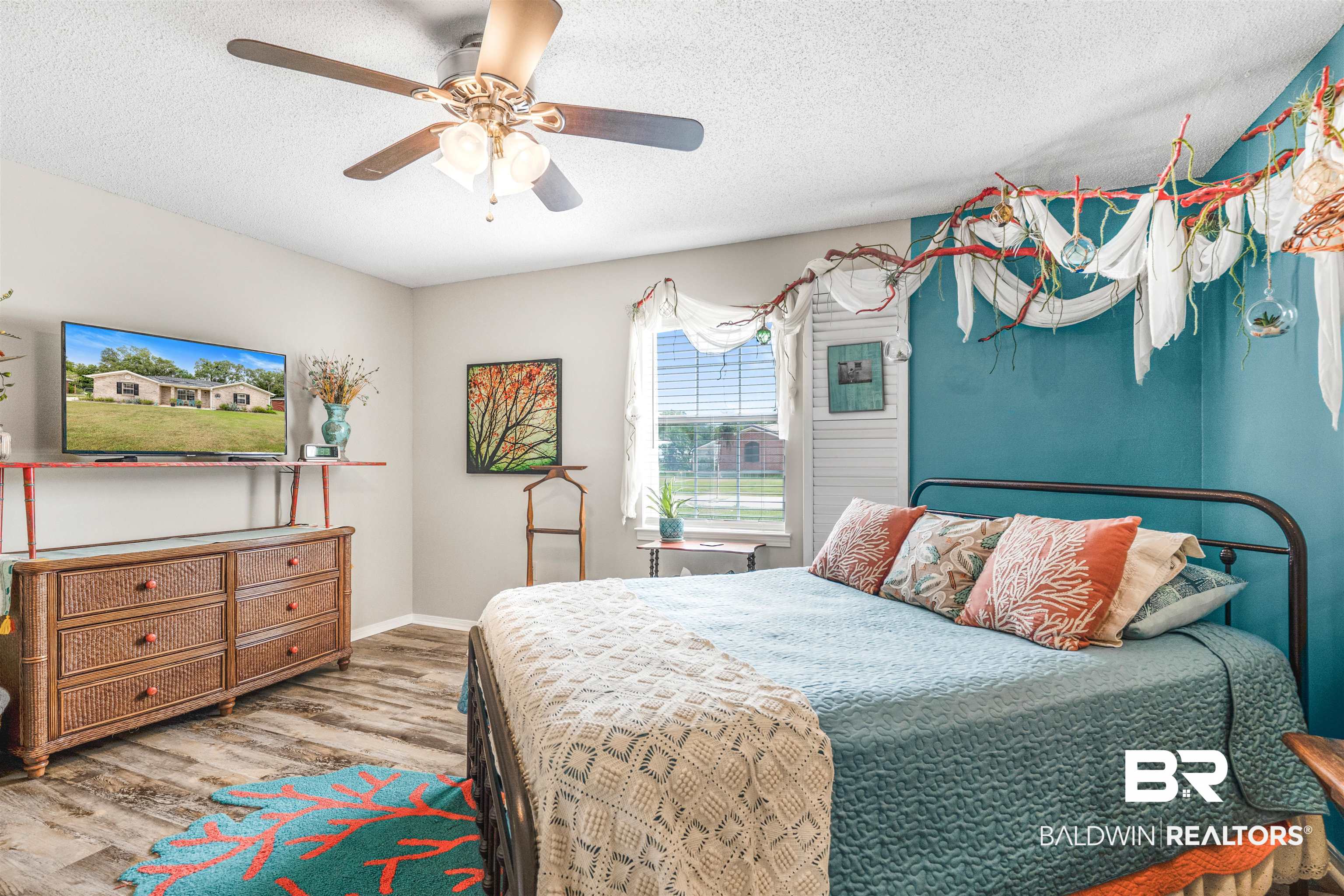 518 Ariel Avenue Foley, AL 36535 - Photo 22 of 47 Bedroom featuring a textured ceiling, ceiling fan, and hardwood / wood-style flooring