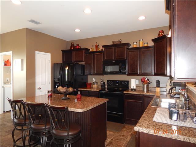 4008 Fox Run North Spring Hill, TN 37174 - Photo 4 of 16 Beautiful kitchen with pantry and large island.