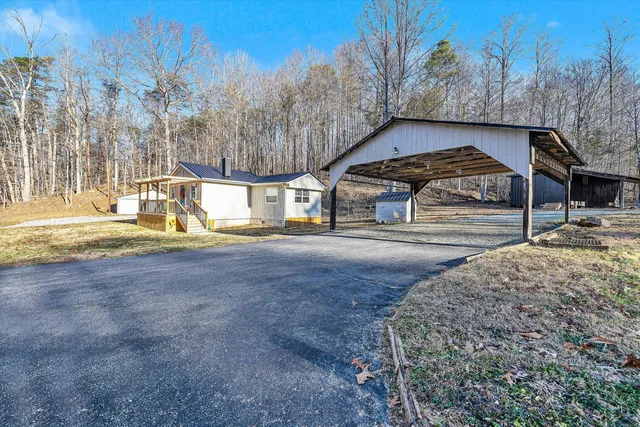 a view of a house with a swimming pool