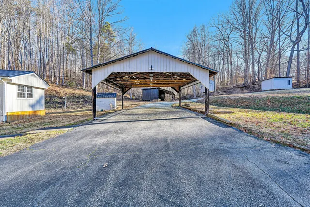 a view of a backyard of the house