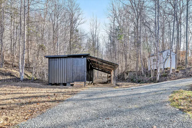a view of a backyard of the house