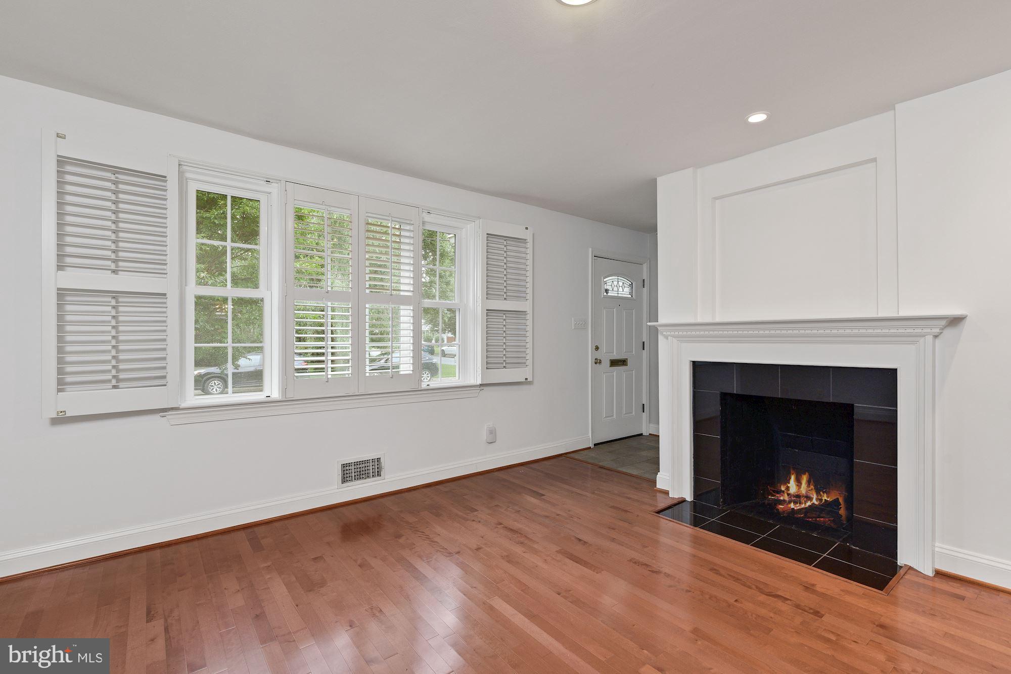 717 Roxboro Road Rockville, MD 20850 - Photo 11 of 62 Welcoming fireplace