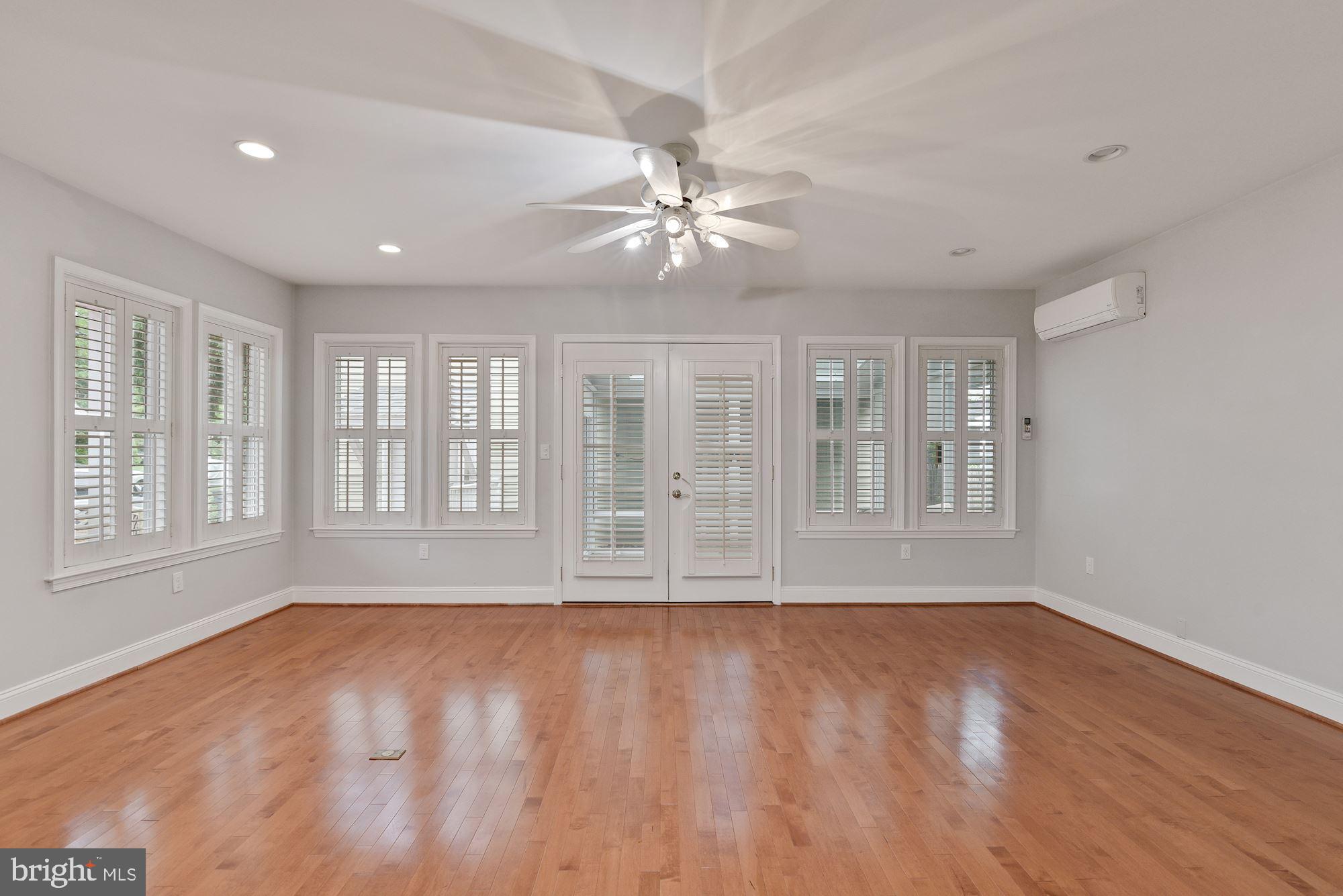 717 Roxboro Road Rockville, MD 20850 - Photo 18 of 62 Living room with endless sunlight