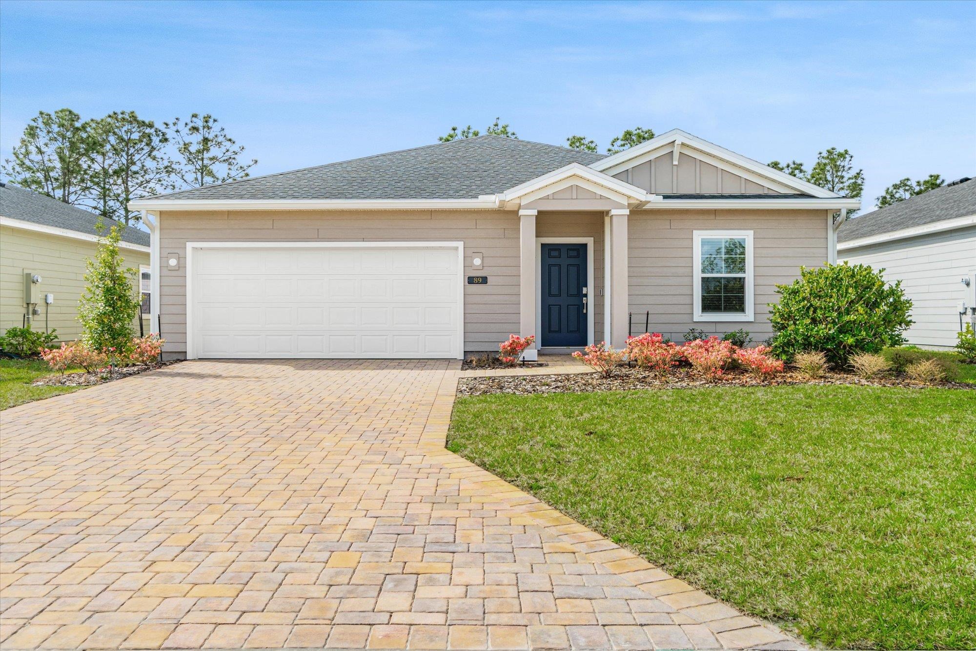 89 Kingsley Pk Way St. Augustine, FL 32084 - Photo 1 of 67 a front view of house with yard and green space