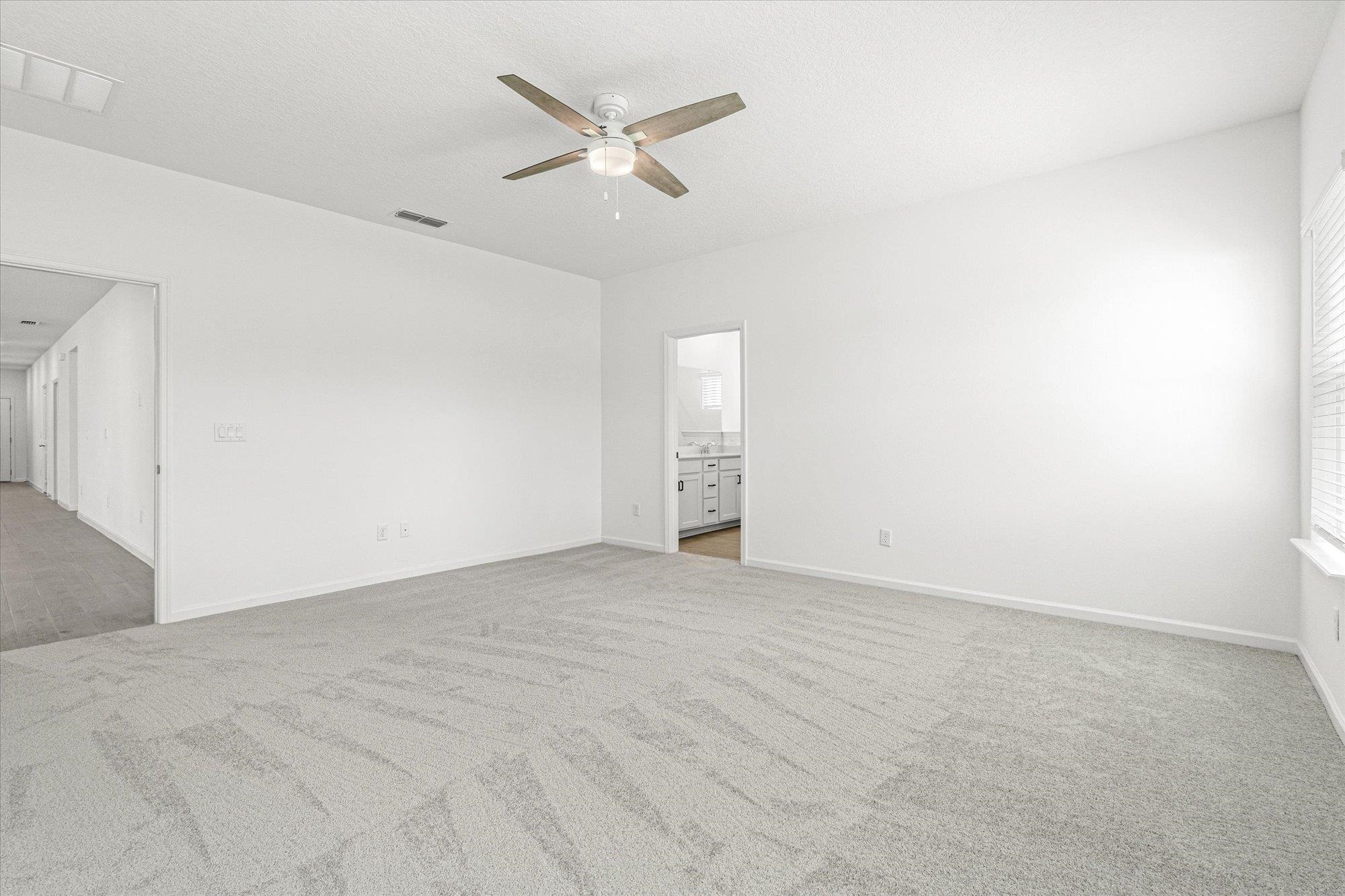 89 Kingsley Pk Way St. Augustine, FL 32084 - Photo 15 of 67 an empty room with a empty space and a ceiling fan