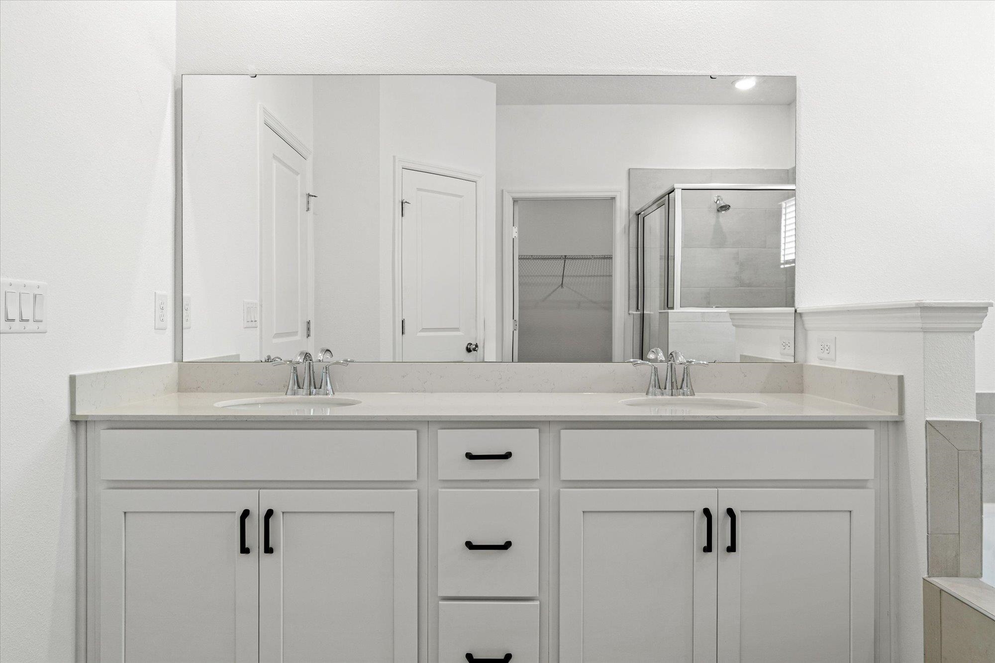 89 Kingsley Pk Way St. Augustine, FL 32084 - Photo 18 of 67 a bathroom with a sink and a mirror