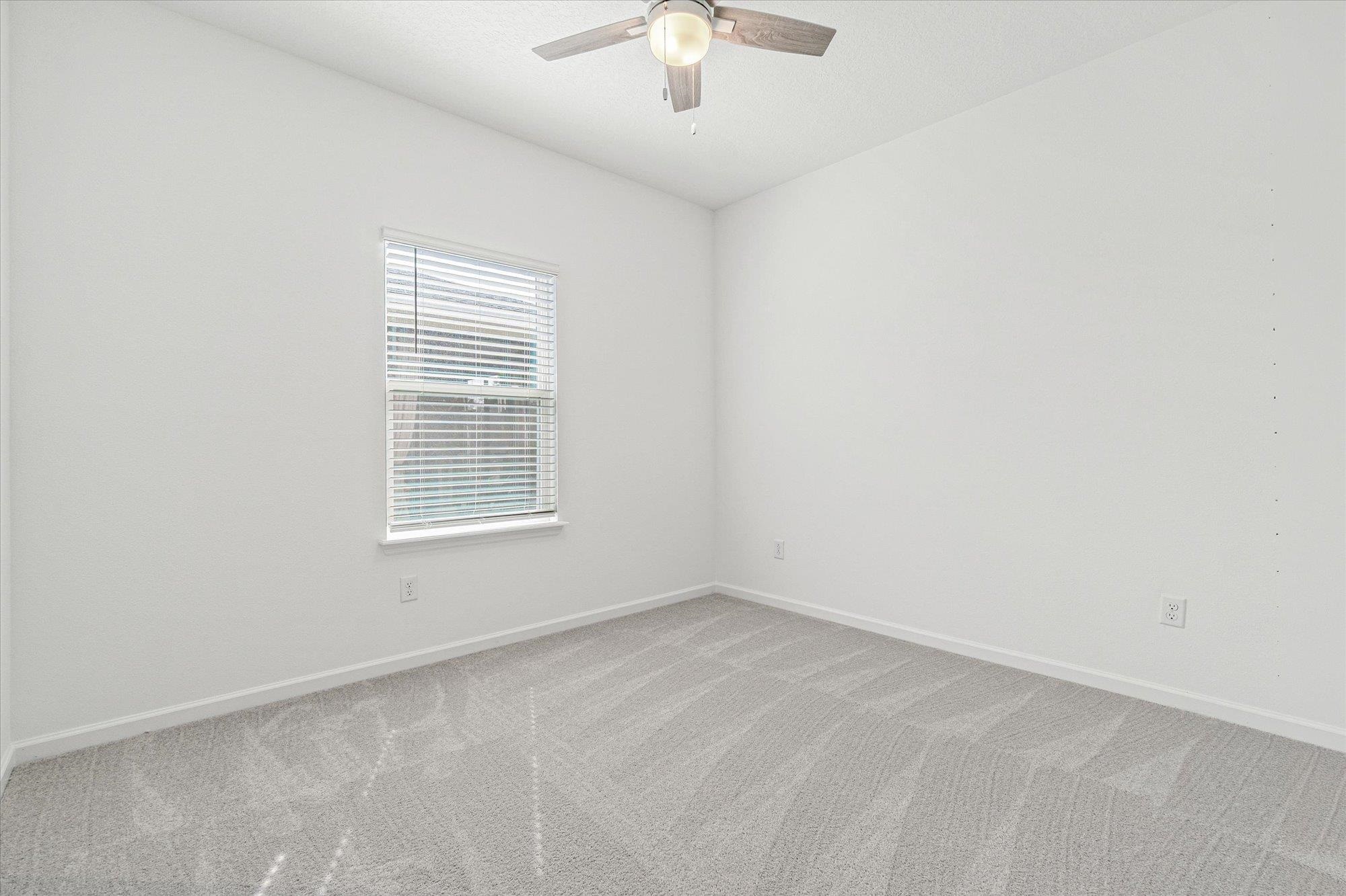 89 Kingsley Pk Way St. Augustine, FL 32084 - Photo 31 of 67 an empty room with a window