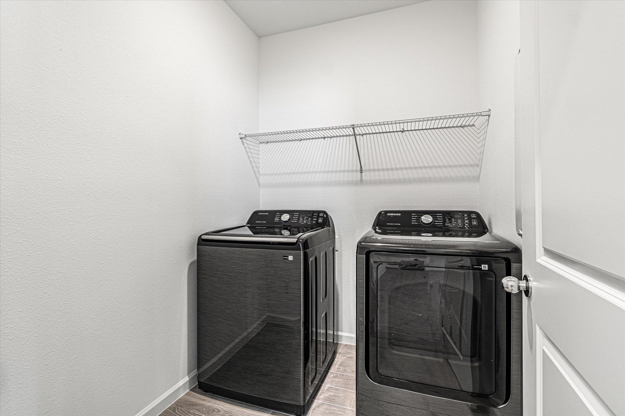89 Kingsley Pk Way St. Augustine, FL 32084 - Photo 34 of 67 a utility room with dryer and washer