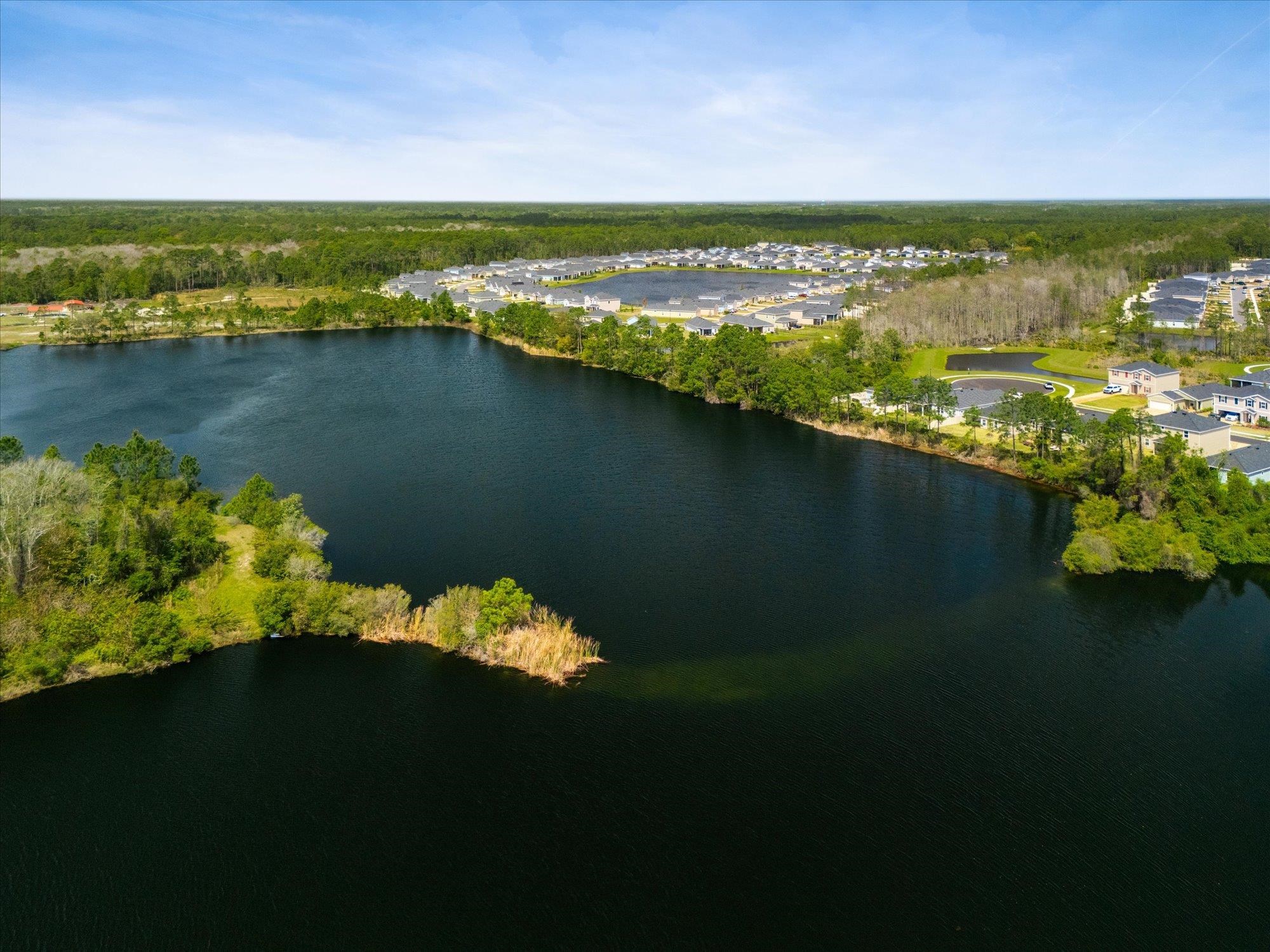 89 Kingsley Pk Way St. Augustine, FL 32084 - Photo 43 of 67 a view of a lake with a mountain