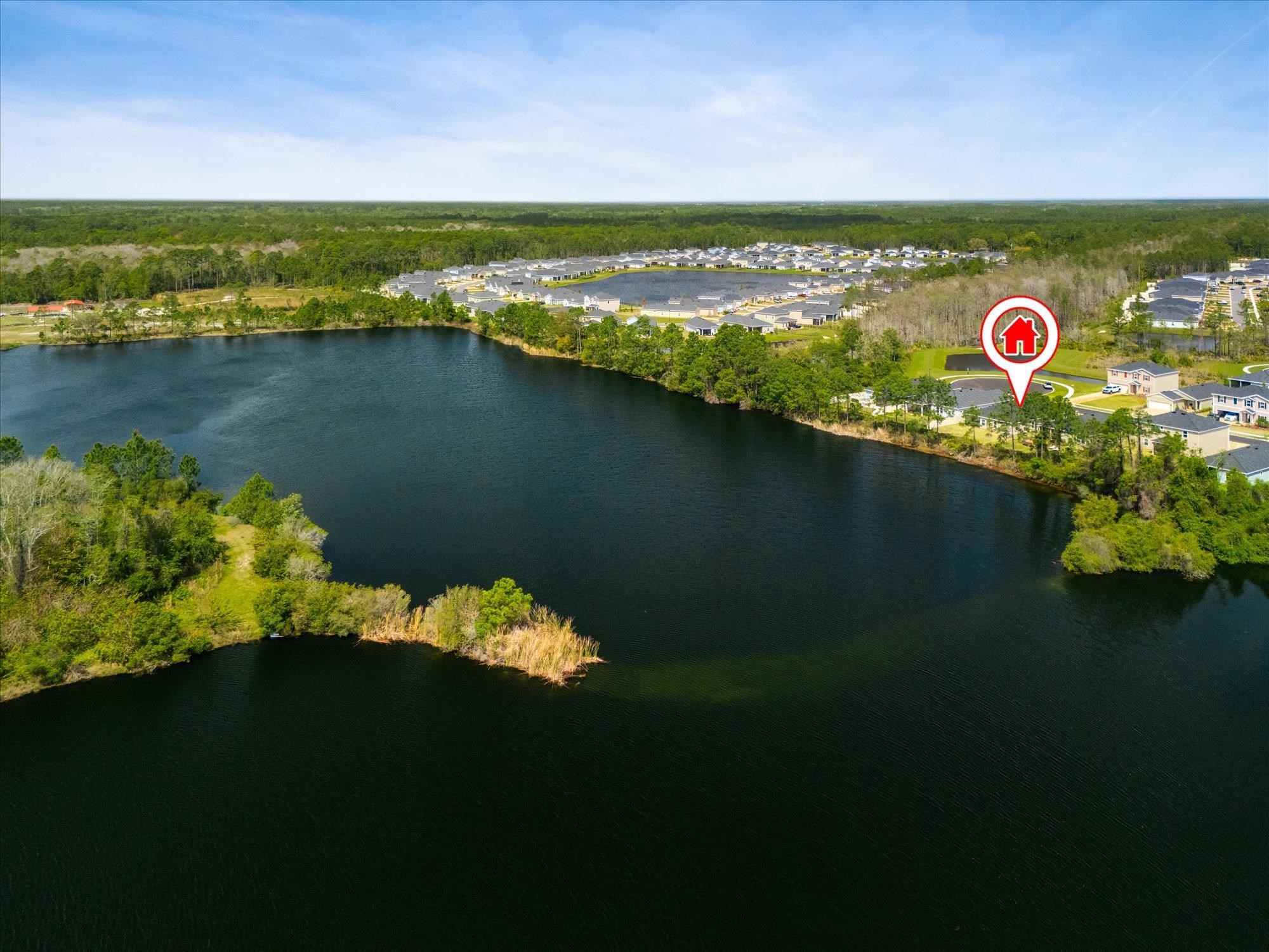 89 Kingsley Pk Way St. Augustine, FL 32084 - Photo 47 of 67 a view of a lake with a city view